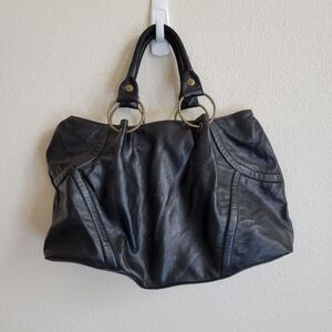 Chateau Elegant Black Leather Tote Shoulder Bag With Brass Colored Hardware.